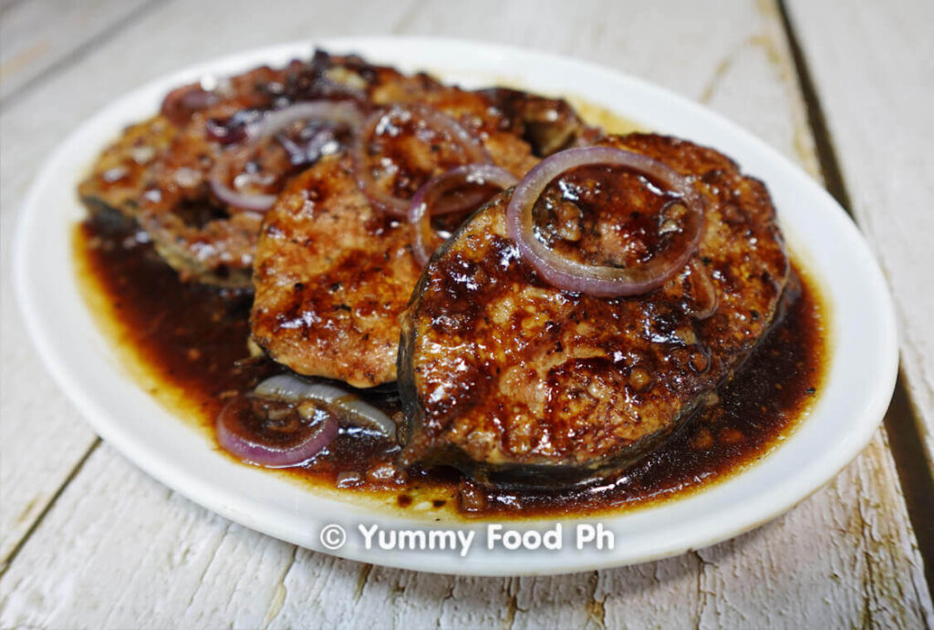 Filipino fish steak recipe in a plate